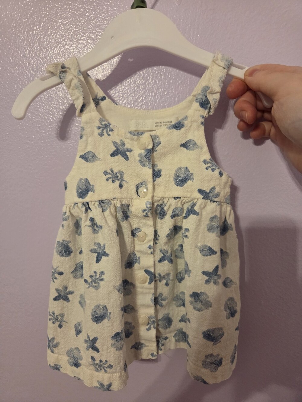 Zara baby girl's white linen dress with a blue marine print